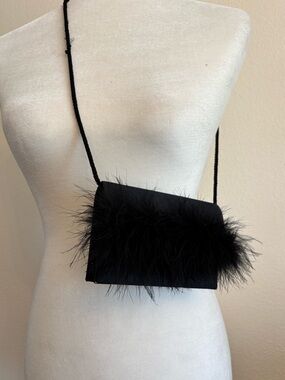 Claire’s Vintage 90’s evening mini bag with Feather detail